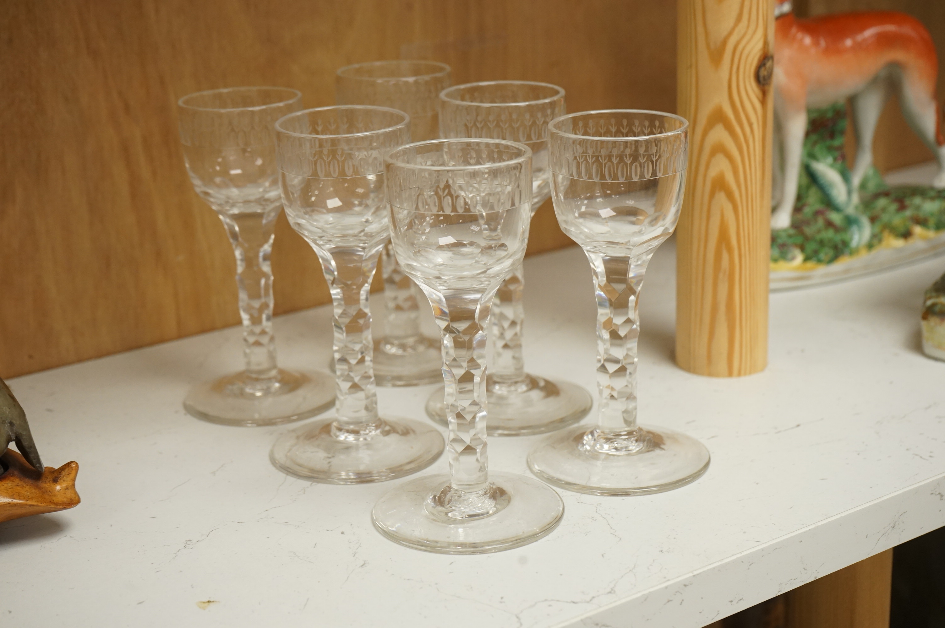 A set of six faceted wine glasses, c.1780, 14cm high